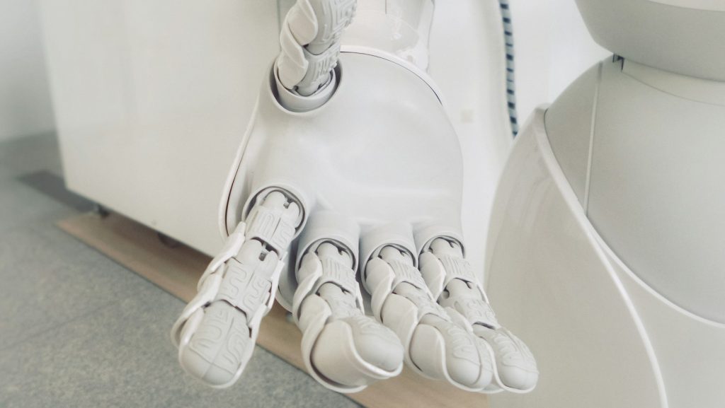 closeup photo of white robot arm